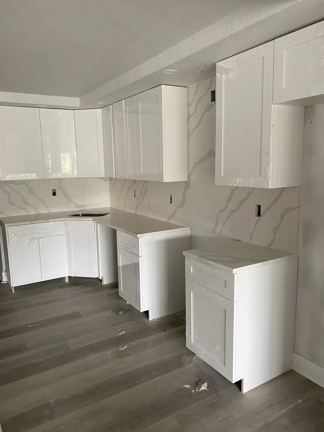 Bathroom renovation with tiled walk-in shower and coordinated finishes